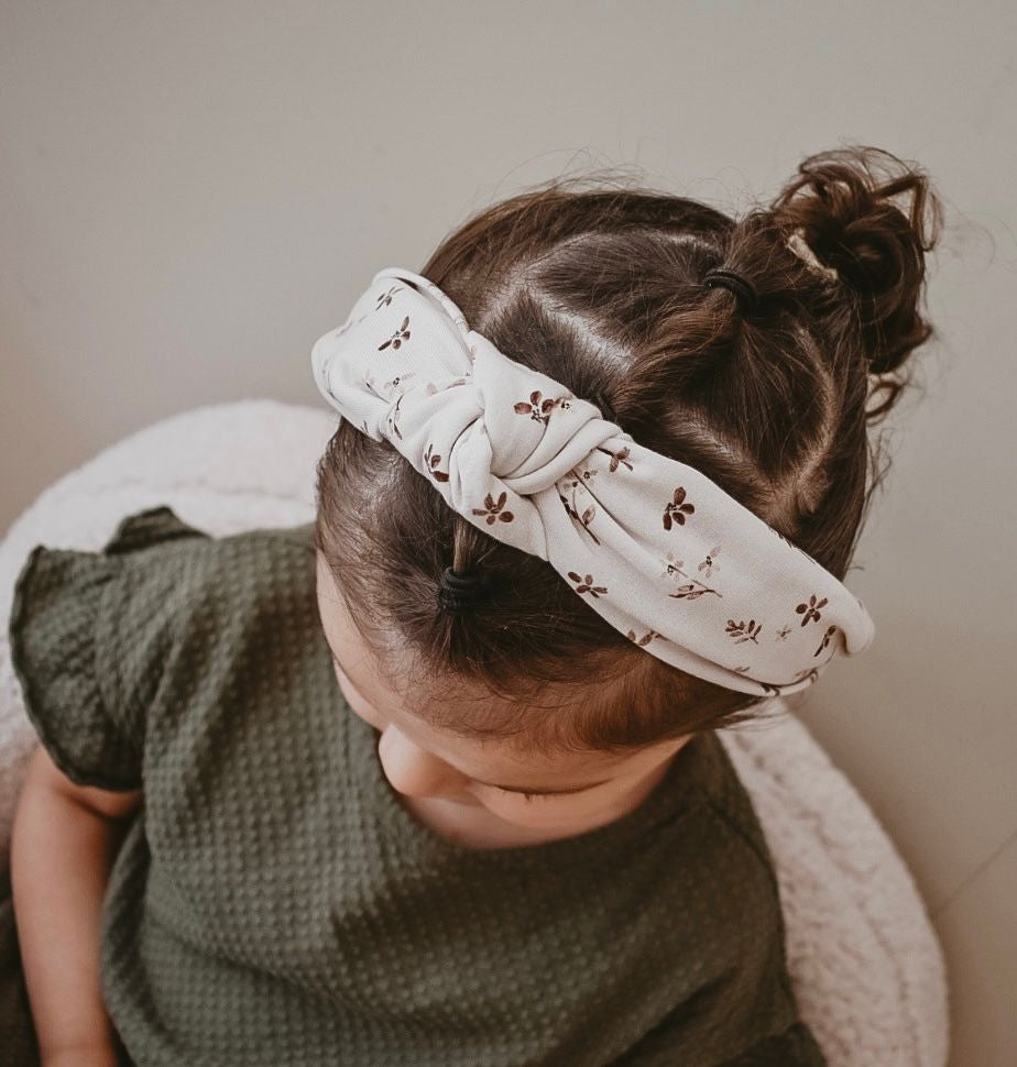 Knop haarband beige met bloemen
